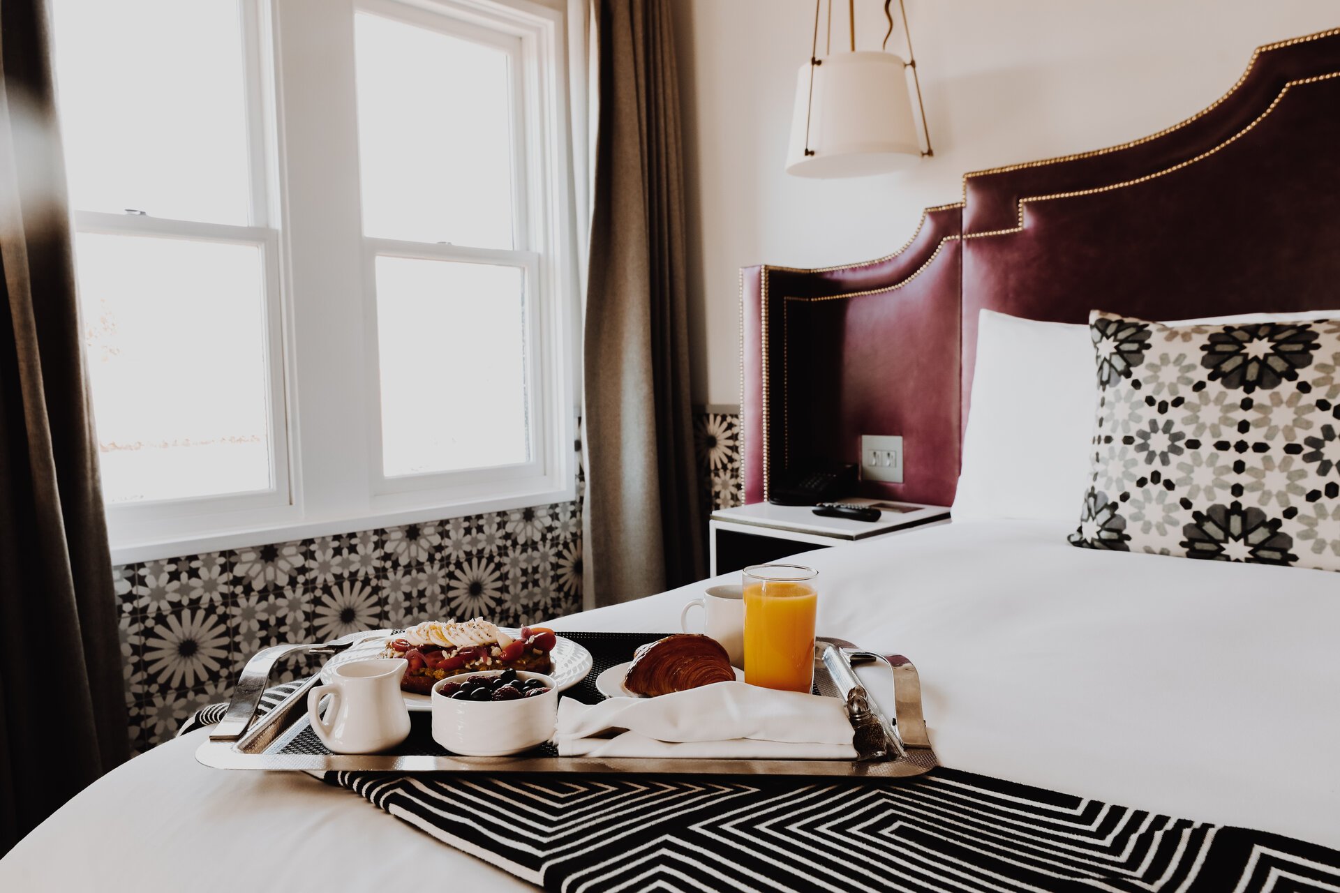 breakfast tray on a bed