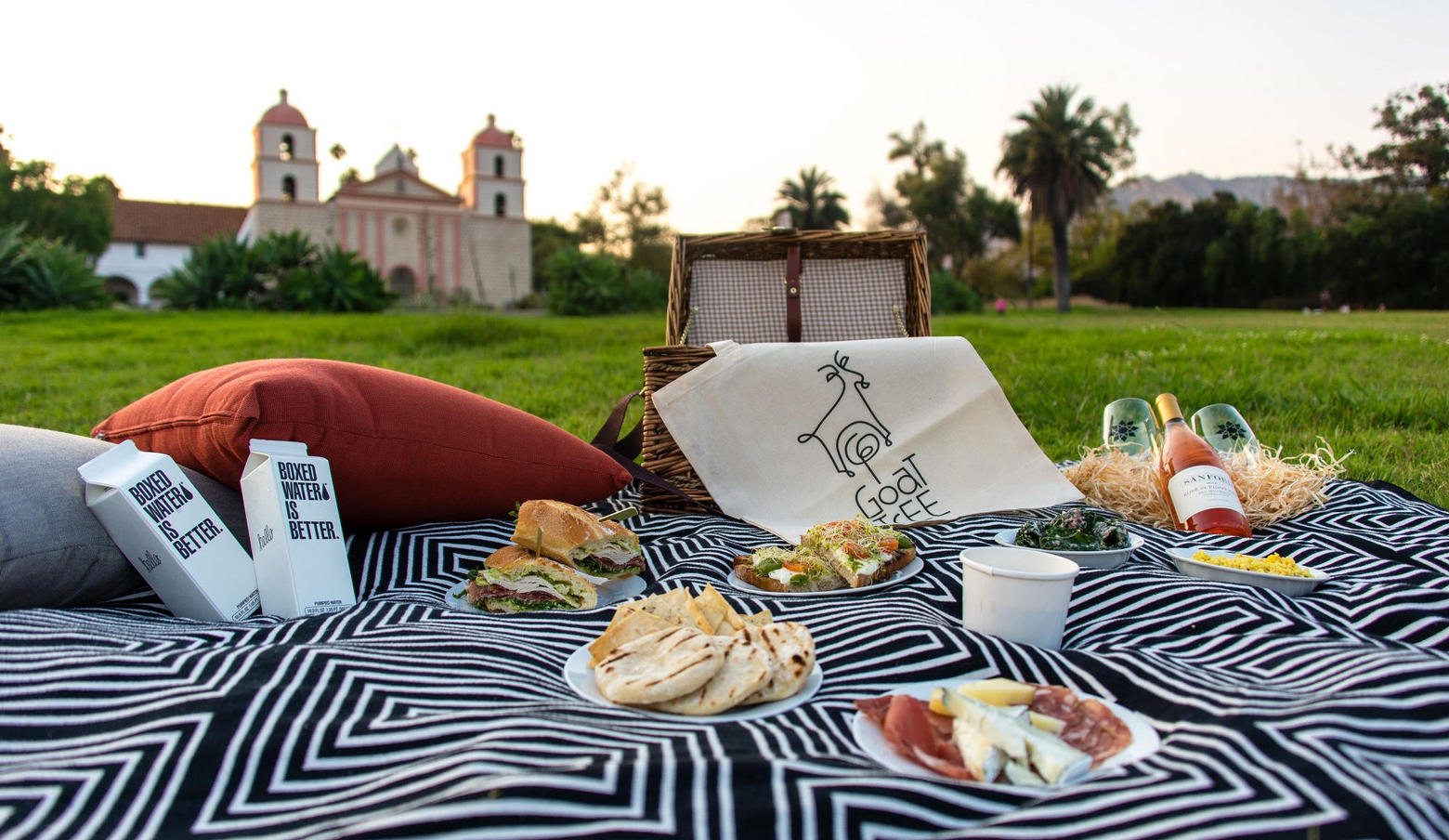 a picnic blanket with food on it