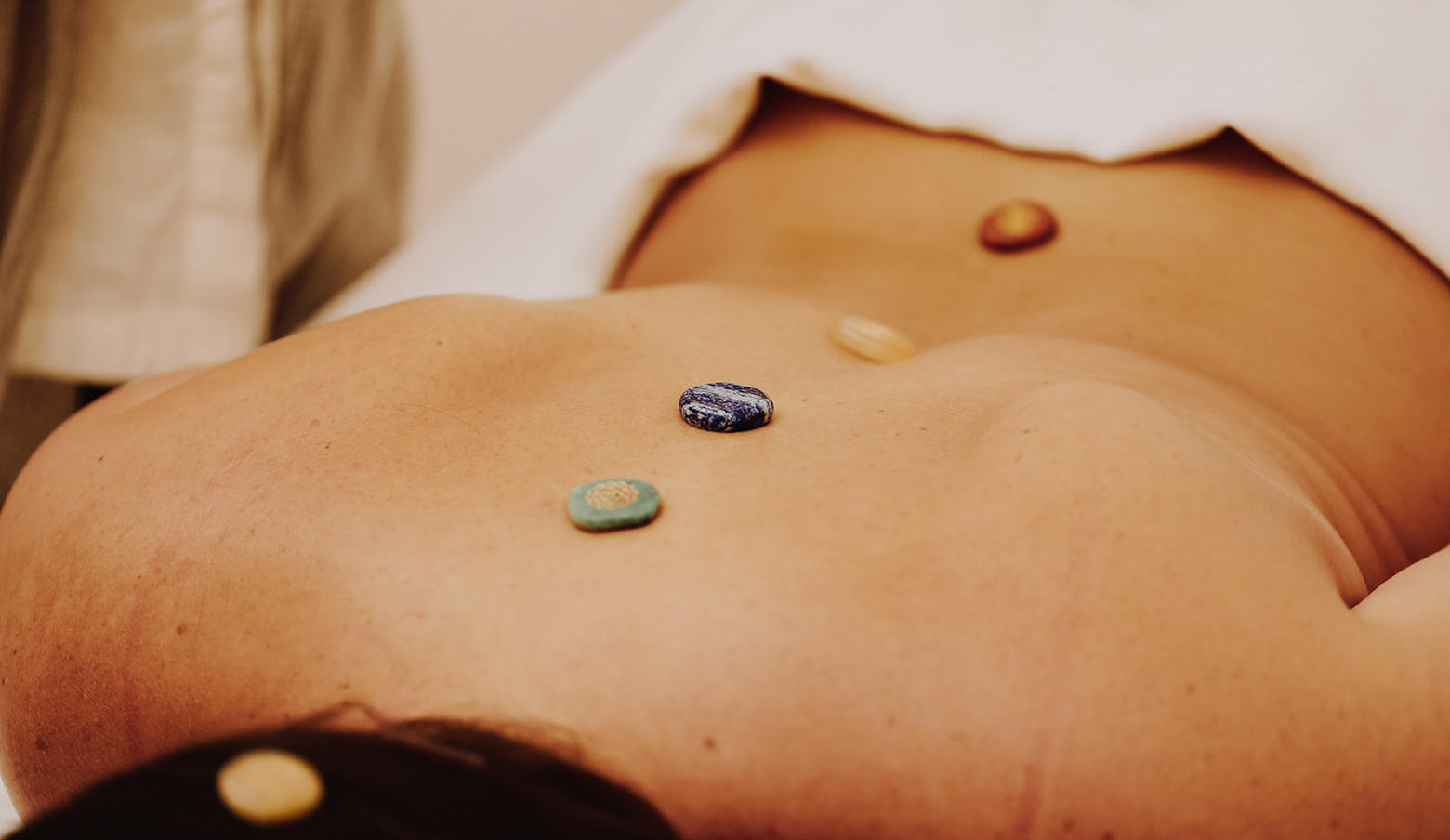 woman getting chakra massage